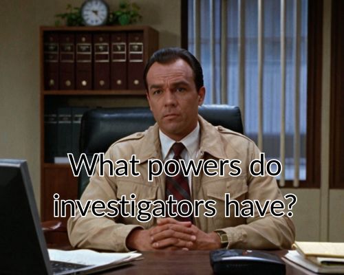 An investigator rests back in the office chair.